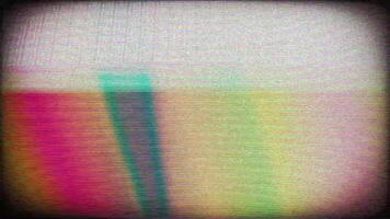 a television screen with a rainbow pattern video