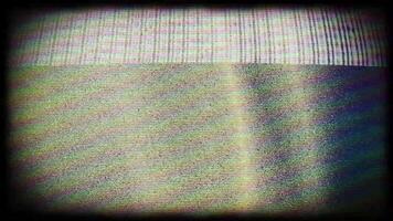 a close up of a television screen with a plaid pattern video