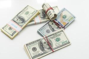 Cash investment in dollars, banknotes, paper, gold photo