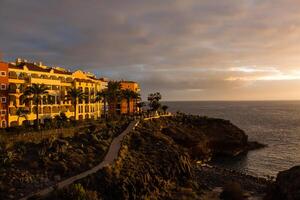 puesta de sol a el playa de el tenerife foto