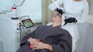 YAG laser for facial therapy at cosmetology clinic video