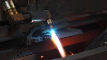 Detail to flame or torch cutting of steel, a chemical reaction between pure oxygen and steel to form iron oxide, heavy industrial concept video