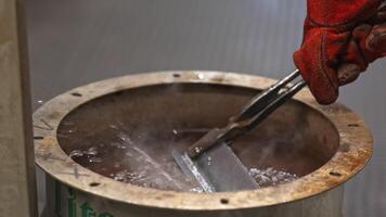 Cooling with cold water in a water bath immediately after welding, process of industry weld concept video