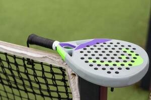 Paddle tennis racket and ball photo