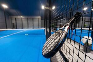 Paddle tennis objects and court. photo