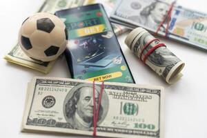 soccer ball over a lot of money. corruption football game. Betting and gambling concept. wold cup photo