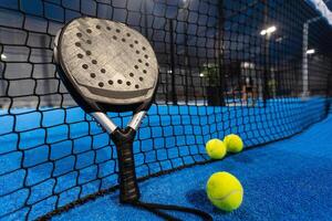 Paddle tennis objects and court. photo