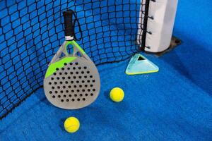 paddle rackets on the playing court photo