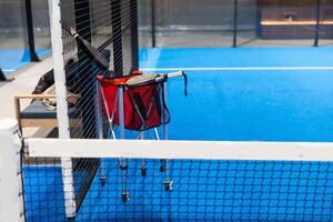 paddle rackets on the playing court photo