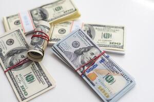 dollar bills of different amounts. Image of the dollar bills in vertical on white background photo