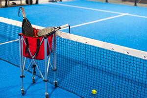 paddle rackets on the playing court photo