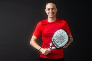 Paddle tennis. Man, Player with hand and Paddel racket and ball photo