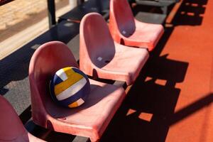 volleyball ball with blurred arena in background. photo