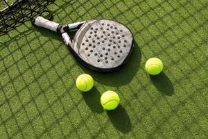paddle tennis still life racket and ball photo