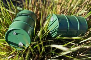 toy oil barrel on a natural background photo