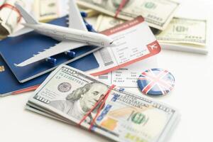 Plane on dollar cash background, travel with airplane concept. photo