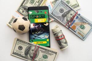 Sport betting online banner concept. app online bet on soccer. Mobile phone with soccer field on screen and realistik football ball in front. illustration photo