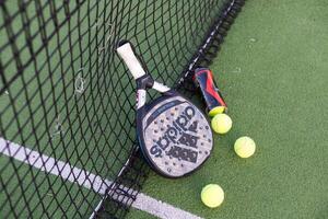 Ukraine Kyiv - March 30, 2024.Paddle tennis racket and ball photo