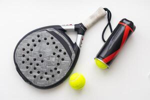 blue professional paddle tennis racket isolated on white background. portrait sport theme poster, greeting cards, headers, website and app photo