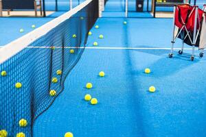 tennis padel balls in court photo