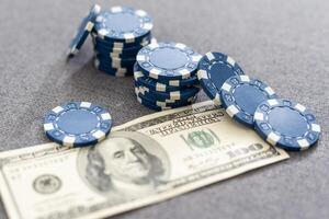 Small Stack of Blue Poker Chips, closeup on background photo