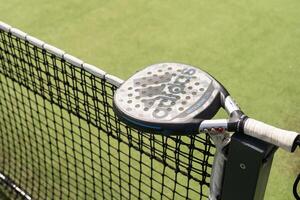 Ukraine Kyiv, April 02 2024. Paddle tennis racket and ball photo