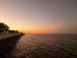 yellow sunset in the river photo