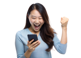 Young woman in blue sweater celebrating success with a raised fist while looking at her phone png