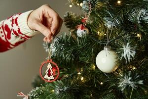 Woman decorated Christmas tree photo