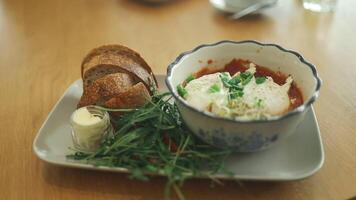 Toast with ham and cheese, bread fried in eggs, breakfast in a cafe video