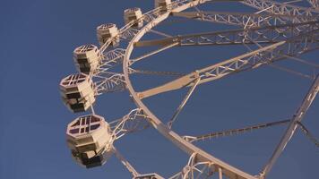Ferris wheel against blue sky video