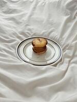 Macaron on Elegant White Plate photo