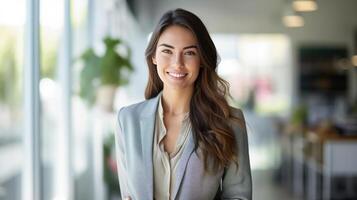Portrait of smiling businesswoman in the office background photo