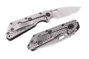 Folding knife on white photo