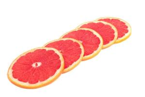 grapefruit slices on white photo