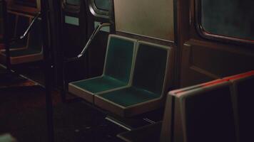 An empty subway seat with the train door open video