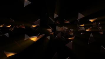 Stylish dark gaming technology background with shiny glass polygon shards flying towards the camera with reflections of golden warm light. Full HD and looping animation. video