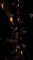 Vertical - stylish dark gaming technology background with shiny glass polygon shards flying towards the camera with reflections of golden warm light. Full HD and looping animation. video