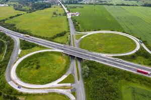 Aerial view from a drone of a road junction. Transportation and infrastructure concept photo