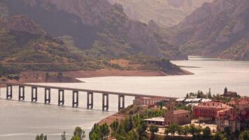 Large bridge over large body of water video