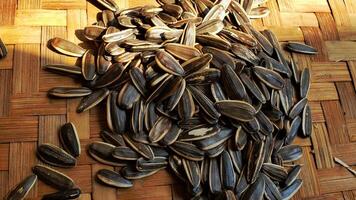 close up a stack of raw sun flower seeds photo