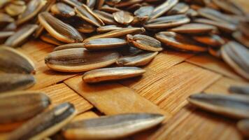 close up a stack of raw sun flower seeds photo