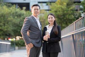 Confident business colleagues in urban setting photo