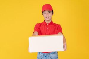 Delivery service professional holding a package photo