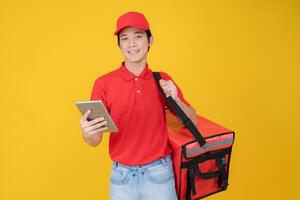 Delivery man using digital tablet photo