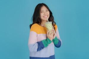 Young woman enjoying bubble tea photo