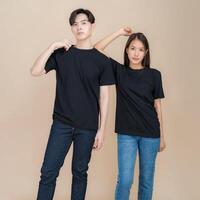 Stylish couple posing in plain black t-shirts photo