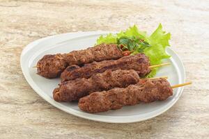 Beef kebab skewer minced meat photo