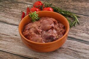 Raw chicken liver in the bowl photo