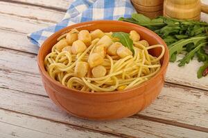 Delicous Pasta with scallop seafood photo